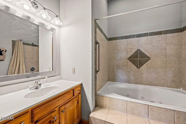 bathroom featuring vanity and a combined bath / shower with jetted tub