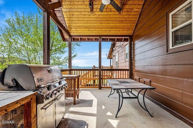view of patio / terrace featuring a ceiling fan and grilling area