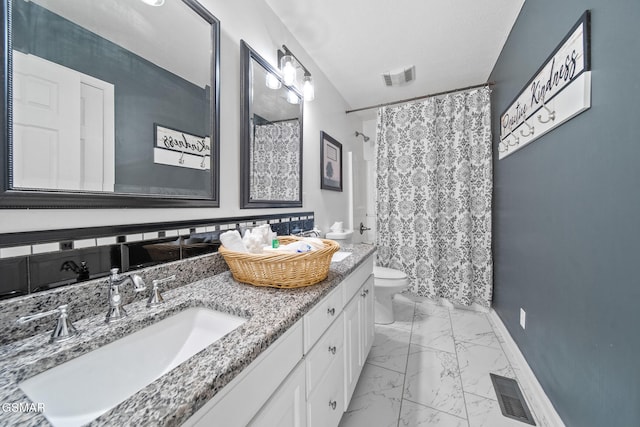 full bathroom with visible vents, a sink, marble finish floor, and toilet