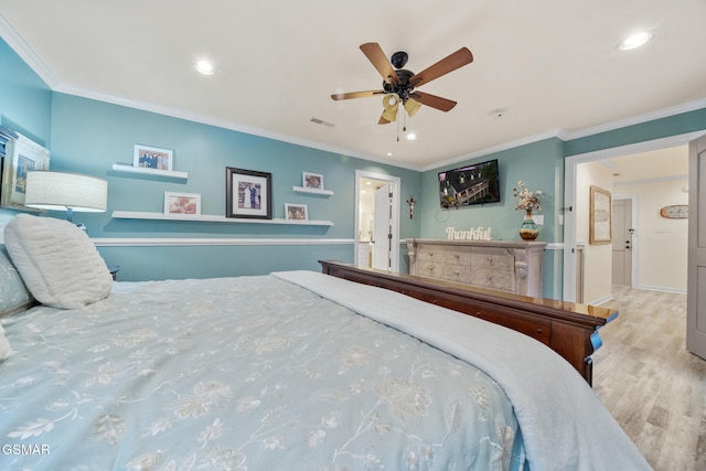 bedroom featuring crown molding, recessed lighting, and wood finished floors