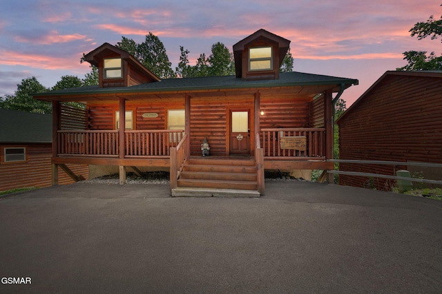 646 Stockton Dr, Sevierville, TN 37876 - view of front of home with a porch and log siding