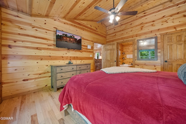 646 Stockton Dr, Sevierville, TN 37876 - bedroom featuring wooden walls, lofted ceiling, light wood finished floors, wood ceiling, and ceiling fan