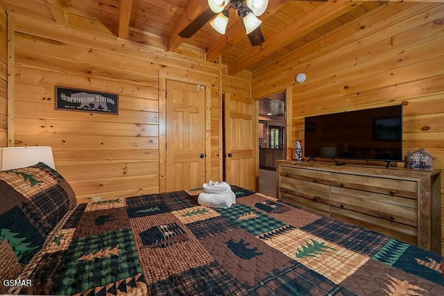 carpeted bedroom featuring beam ceiling, wood walls, and wood ceiling