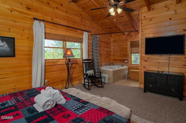 carpeted bedroom featuring lofted ceiling with beams, wood ceiling, and wood walls