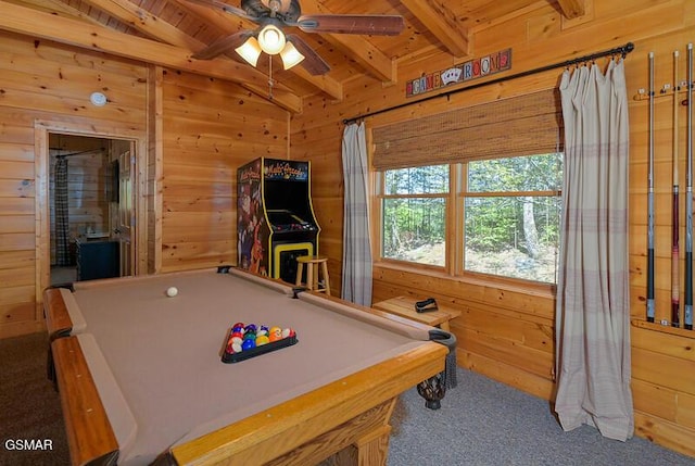 rec room with a ceiling fan, wooden walls, carpet flooring, and wood ceiling