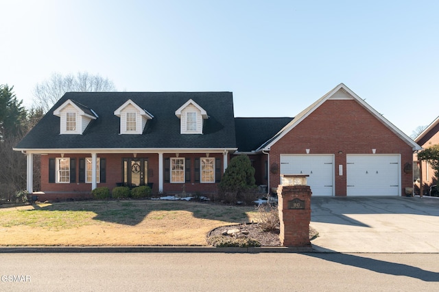 view of front facade featuring a garage and covered porch