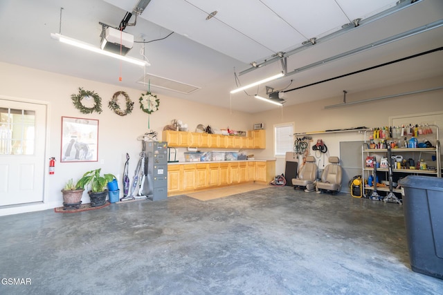 garage featuring a garage door opener