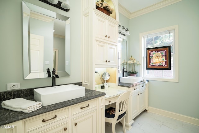 bathroom featuring crown molding and vanity