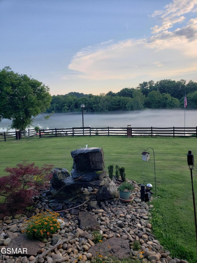 view of yard featuring a water view