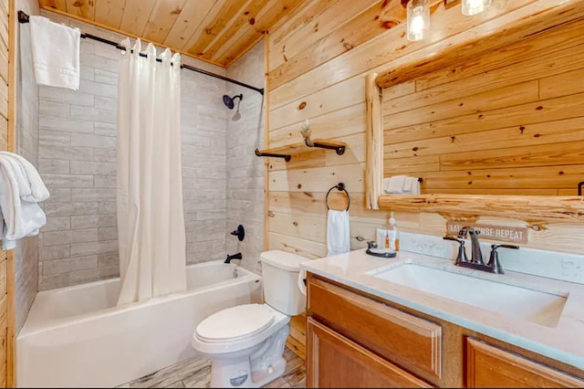 full bathroom with wooden ceiling, shower / bath combo, wood walls, toilet, and vanity