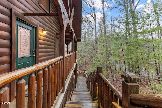 exterior space featuring log veneer siding