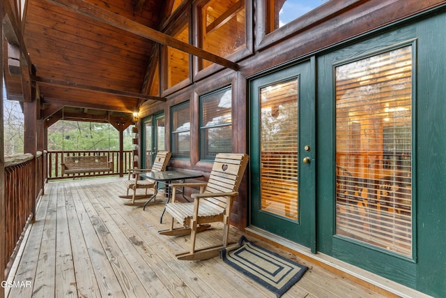 wooden terrace featuring french doors