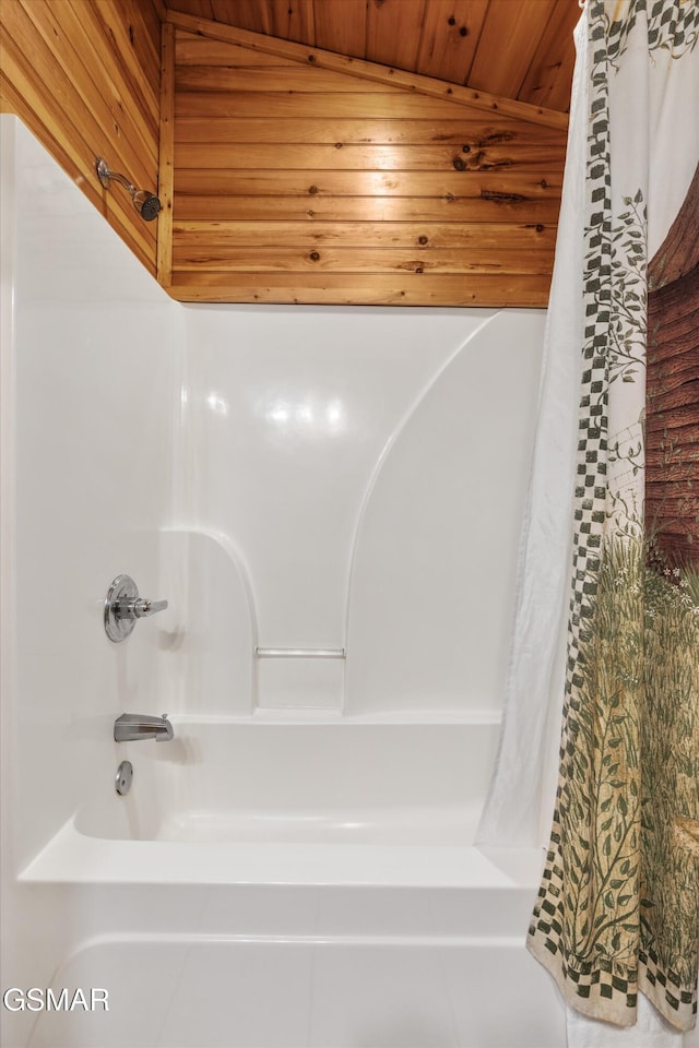 bathroom with shower / bathtub combination with curtain and wood ceiling
