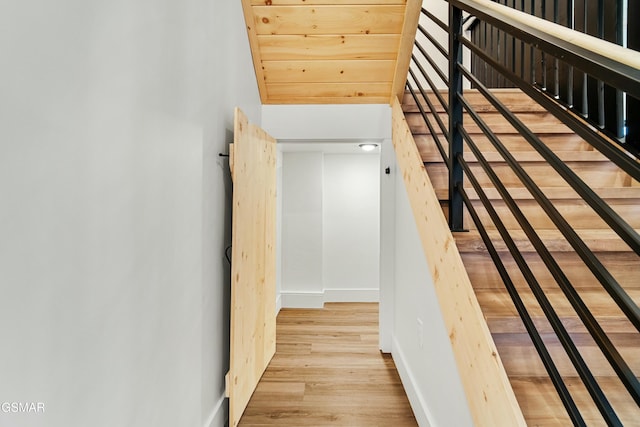 staircase featuring hardwood / wood-style flooring