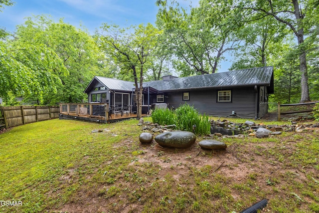 2887 Pine Haven Dr, Sevierville, TN 37862 - back of house with metal roof and a chimney