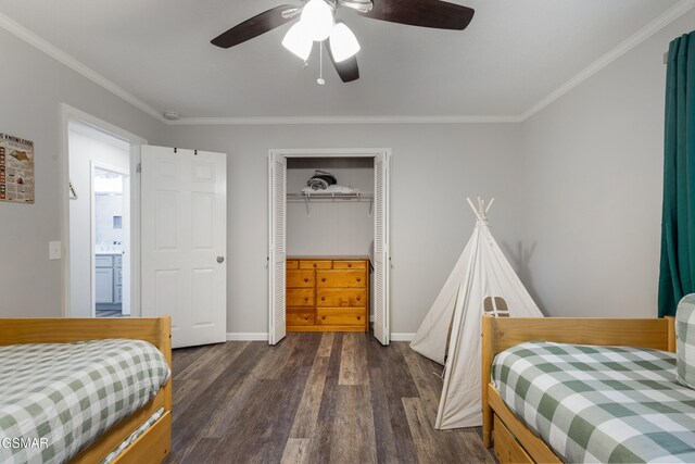2887 Pine Haven Dr, Sevierville, TN 37862 - bedroom featuring dark wood-style flooring, crown molding, a closet, baseboards, and ceiling fan