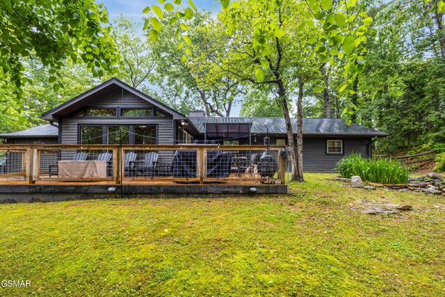 2887 Pine Haven Dr, Sevierville, TN 37862 - back of house featuring a wooden deck and a yard