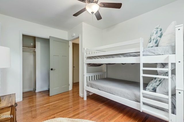 bedroom featuring ceiling fan and wood finished floors