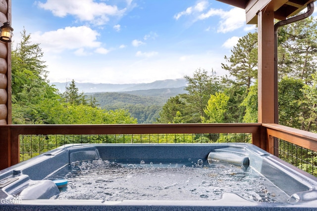 1830 Blue Tick Way, Sevierville, TN 37876 - wooden deck with a hot tub and a mountain view