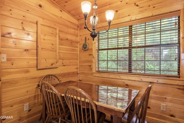 1830 Blue Tick Way, Sevierville, TN 37876 - dining room with a chandelier, wood walls, healthy amount of natural light, and wooden ceiling