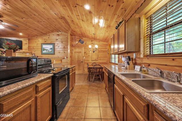 1830 Blue Tick Way, Sevierville, TN 37876 - kitchen with black appliances, vaulted ceiling, wooden walls, healthy amount of natural light, and wooden ceiling