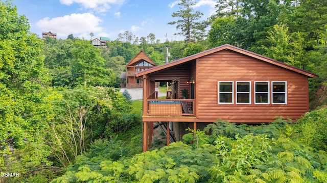 1830 Blue Tick Way, Sevierville, TN 37876 - rear view of property with log veneer siding and a wooden deck