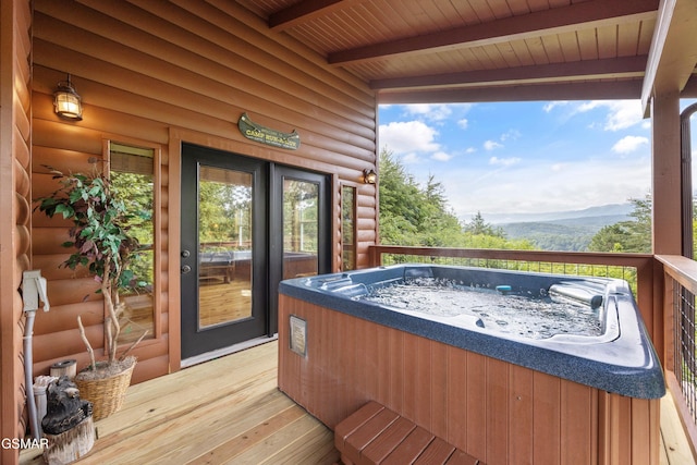 1830 Blue Tick Way, Sevierville, TN 37876 - wooden deck with a hot tub and a mountain view