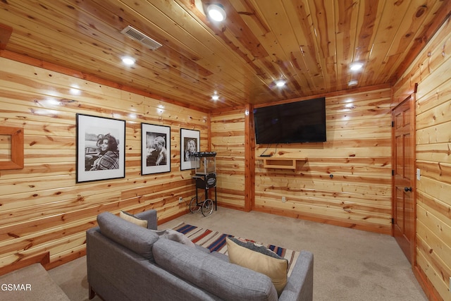 living room with wood ceiling, light colored carpet, and wood walls