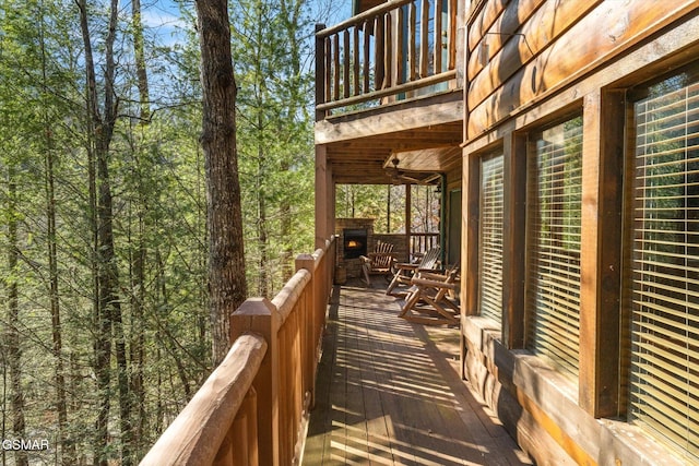 wooden deck with ceiling fan