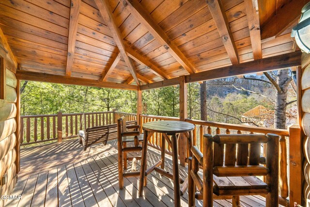 wooden deck featuring a gazebo