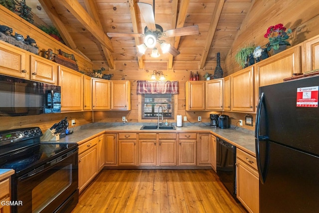 kitchen with black appliances, vaulted ceiling with beams, sink, light wood-type flooring, and wood ceiling