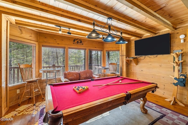 recreation room featuring beam ceiling, wood walls, pool table, and wooden ceiling