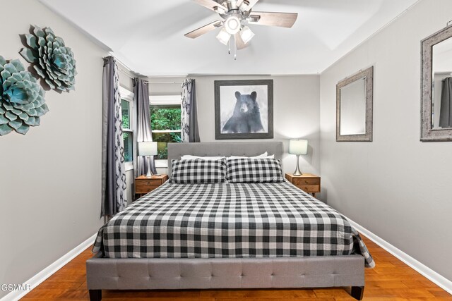 bedroom featuring ceiling fan and wood-type flooring