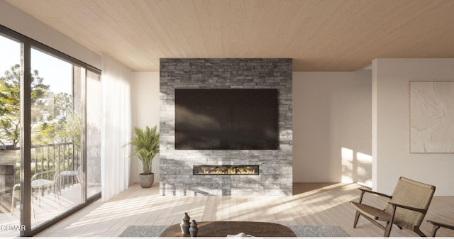 living room with wood-type flooring, wood ceiling, and a fireplace