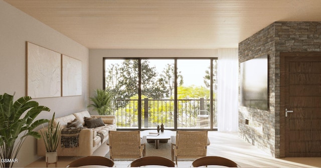 living room featuring light wood-type flooring and wooden ceiling