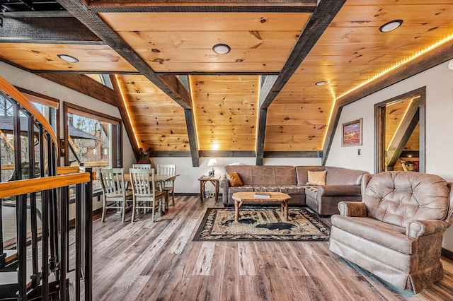 interior space with wood ceiling, vaulted ceiling, and hardwood / wood-style floors