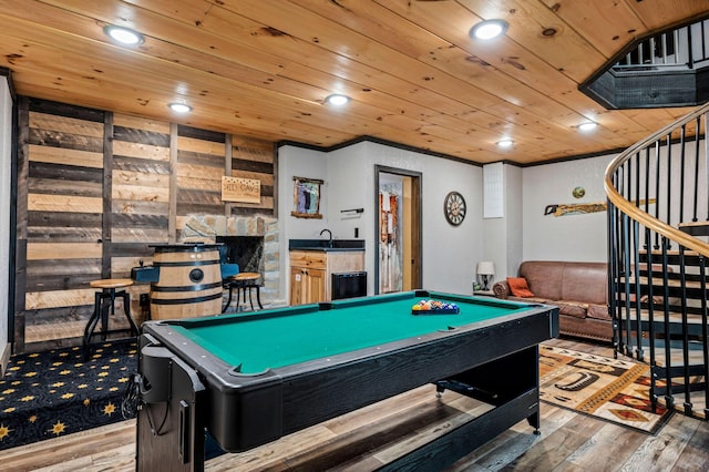 playroom featuring hardwood / wood-style flooring, wet bar, wood ceiling, and billiards