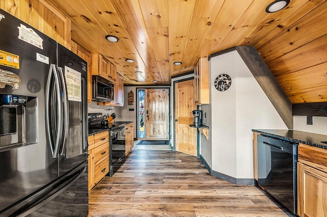 kitchen featuring wood ceiling, wood-type flooring, and black appliances