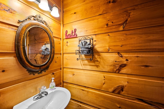662 Morning Mist Way, Gatlinburg, TN 37738 - bathroom featuring a sink and wood walls