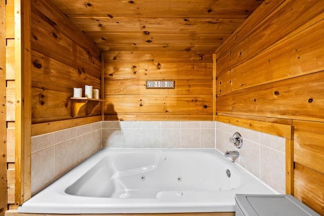 662 Morning Mist Way, Gatlinburg, TN 37738 - bathroom with a whirlpool tub, wooden walls, and wooden ceiling