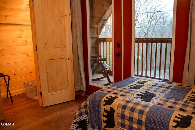 bedroom with wood finished floors