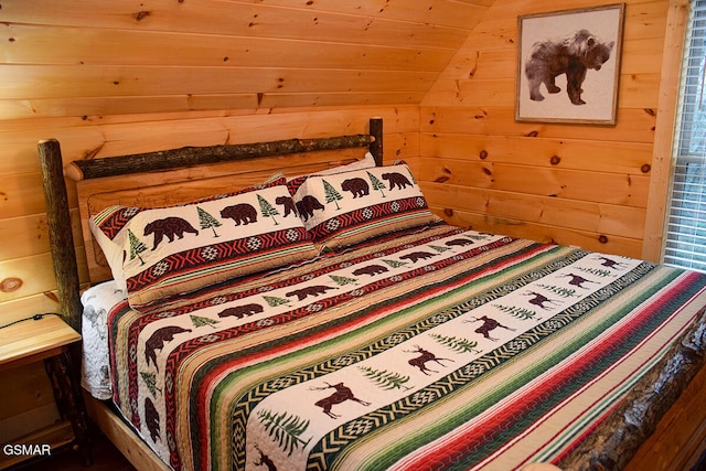bedroom with wooden walls