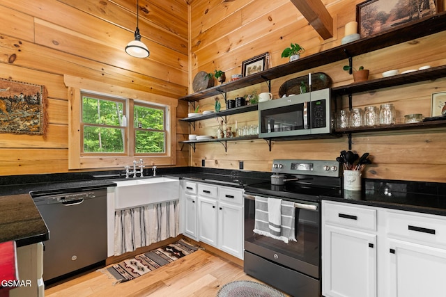 1948 Grouse Top Rd, Walland, TN 37886 - kitchen with electric range, stainless steel microwave, dishwasher, open shelves, and white cabinets
