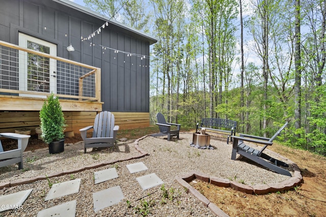 view of patio featuring an outdoor fire pit