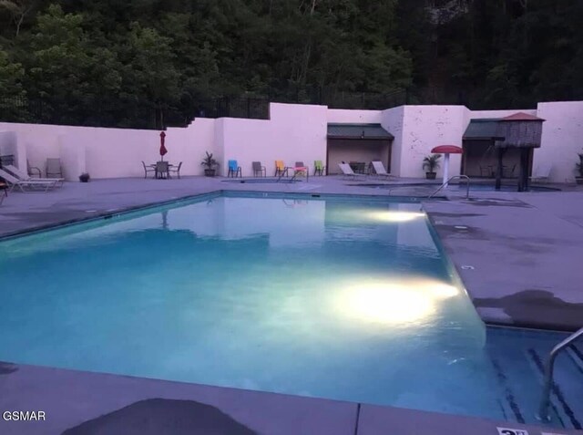 684 Stockton Dr, Sevierville, TN 37876 - community pool featuring a patio