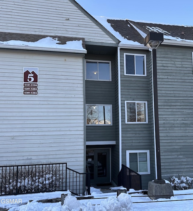 view of snow covered building