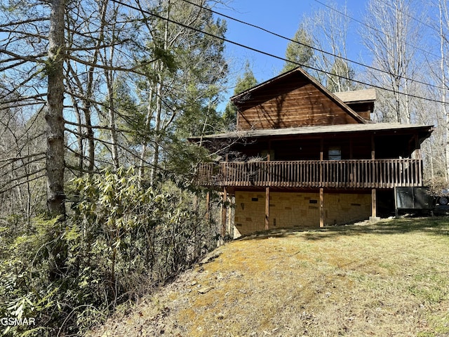 view of home's exterior with a deck