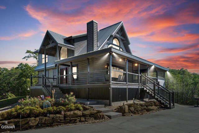 view of front of home featuring covered porch