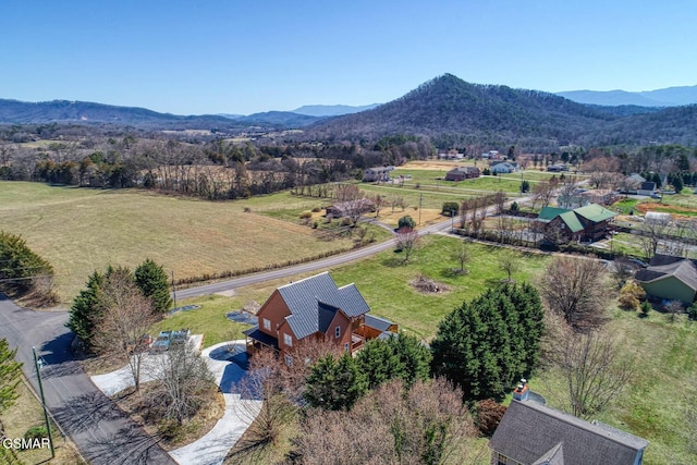 bird's eye view featuring a rural view and a mountain view