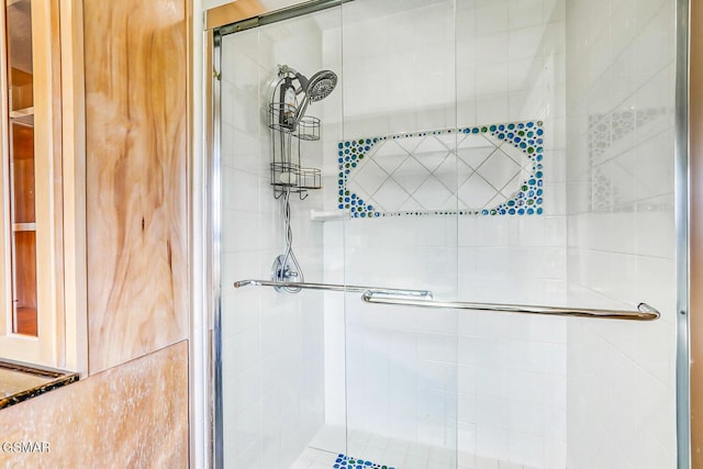 bathroom with a stall shower